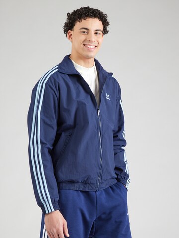Geacă de primăvară-toamnă de la ADIDAS ORIGINALS pe albastru: față