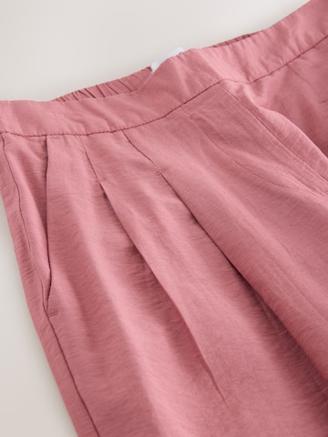 Next Široke hlačnice Hlače | roza barva