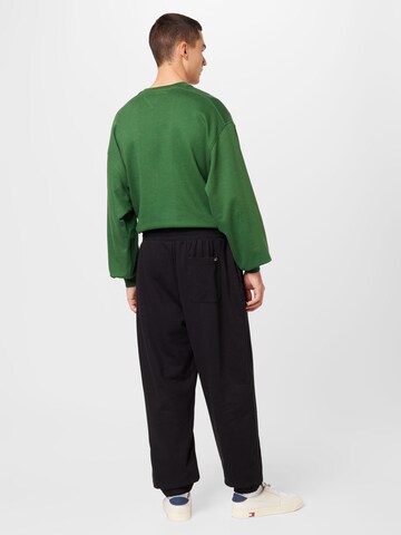 Tommy Jeans Regular Trousers in Black