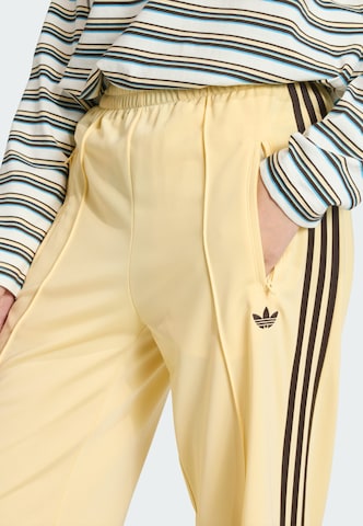 ADIDAS ORIGINALS - Perna larga Calças em laranja