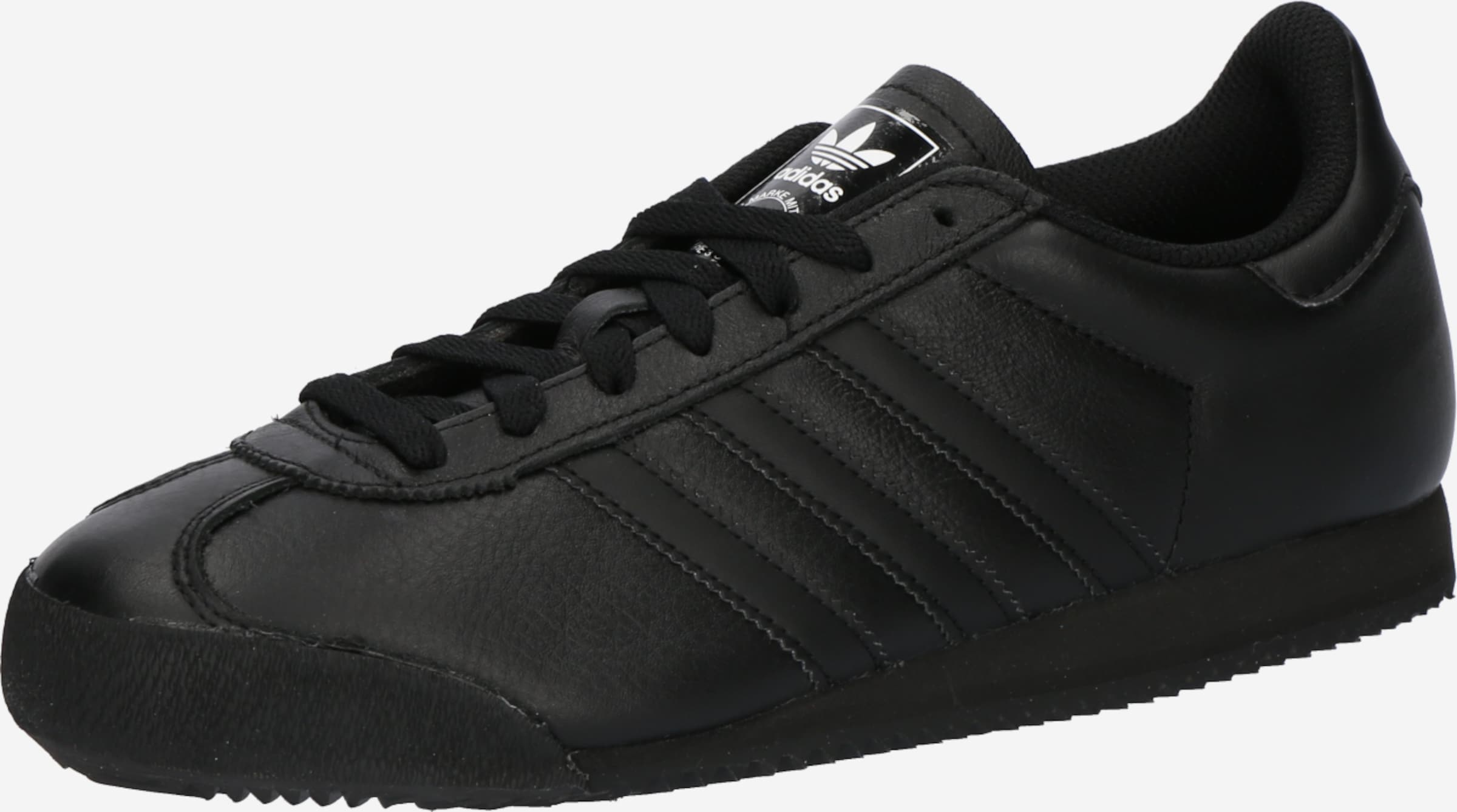 All black adidas samoa sales