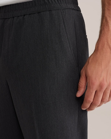 WE Fashion - regular Pantalón de pinzas en negro
