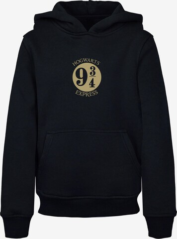 Sweat-shirt 'Harry Potter - Platform Chibi Gold Foil' ABSOLUTE CULT en noir : devant
