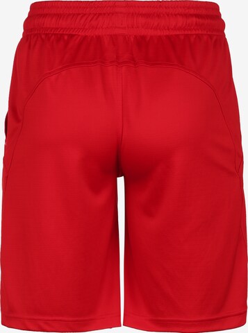 Loosefit Pantalon de sport UNDER ARMOUR en rouge