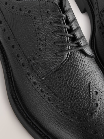 Chaussure à lacets Next en noir