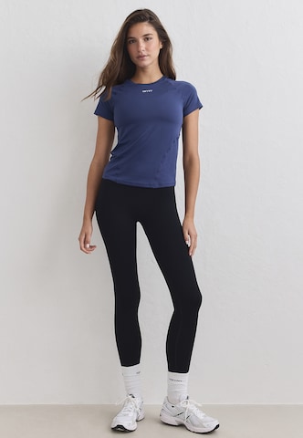 Aim'n - Camisa funcionais em azul