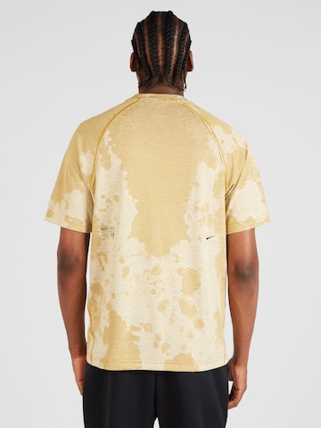 NIKE Performance shirt 'ADV' in Yellow