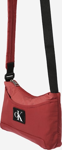 Calvin Klein Jeans Crossbody Bag in Brown: front