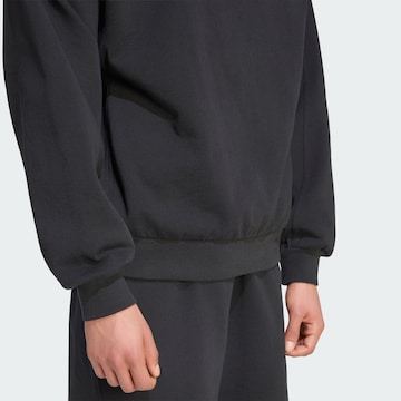 ADIDAS SPORTSWEAR - Camiseta deportiva en negro