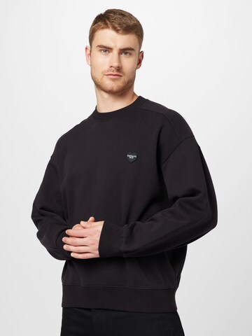 Carhartt WIP - Sweatshirt em preto: frente