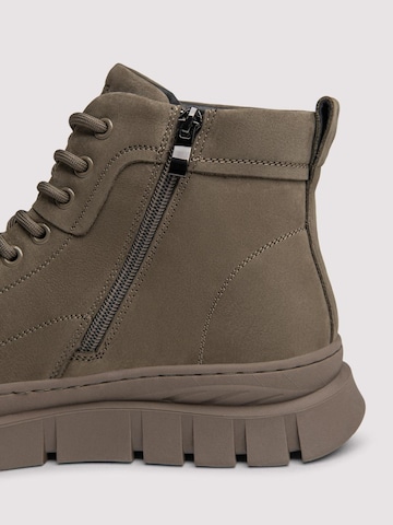 Ombre - Botas con cordones en verde