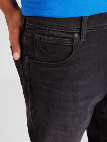 Coupe slim Jean 'TEXAS' WRANGLER en noir