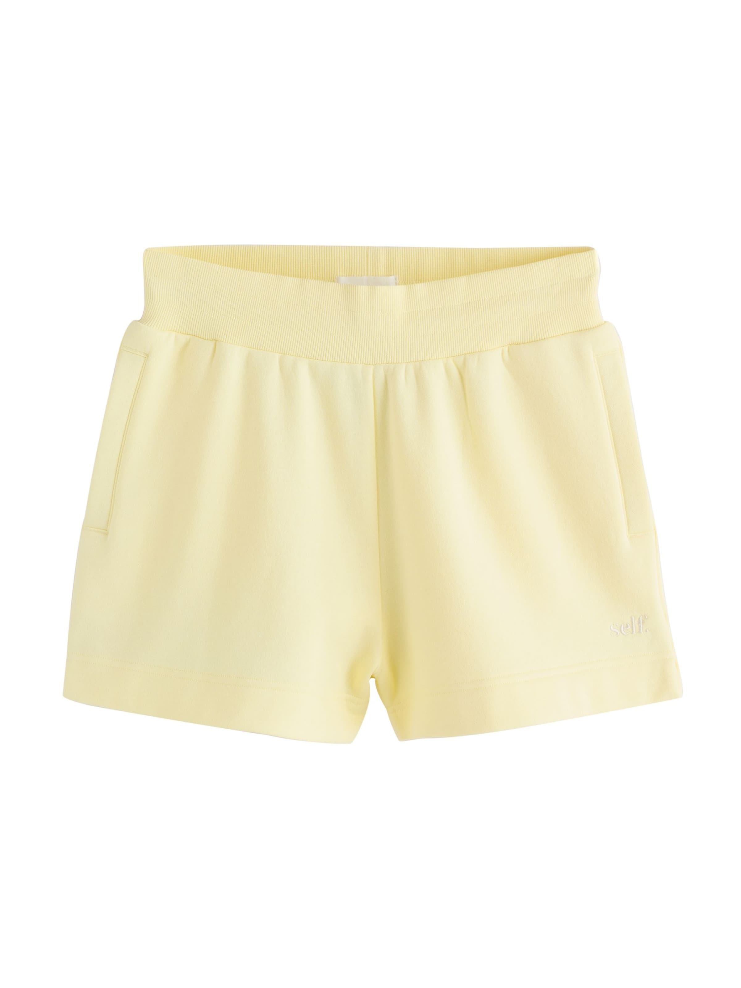 self. Regular Pants in Yellow: front