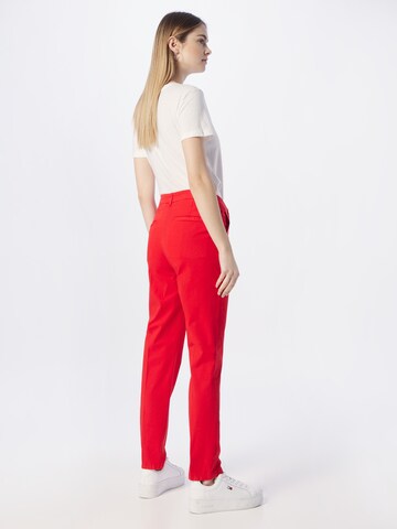 Coupe slim Pantalon chino TOMMY HILFIGER en rouge