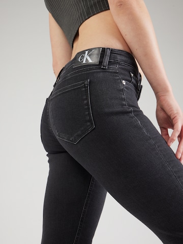 juoda Calvin Klein Jeans Siauras Džinsai 'MID RISE SKINNY'