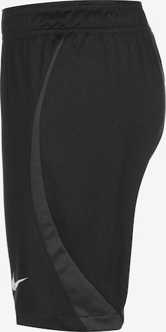 NIKE Loosefit Sporthose in Schwarz