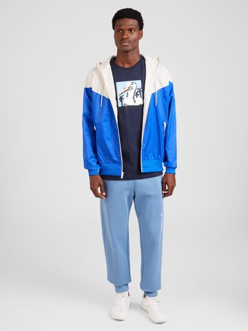 Cleptomanicx T-Shirt 'Souvenir' in Blau