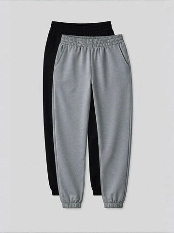 Effilé Pantalon de sport Tommy Life en mélange de couleurs : devant