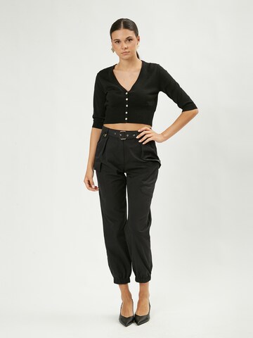 Tapered Pantaloni cargo di Influencer in nero