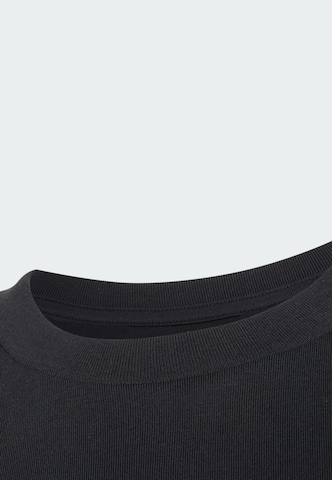 ADIDAS PERFORMANCE - Camiseta funcional en negro