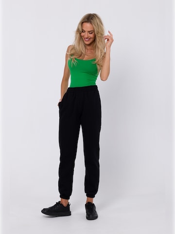 made of emotion Tapered Hose in Schwarz