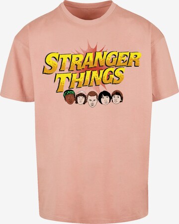 T-Shirt 'Stranger Things Comic Heads Netflix TV Series' F4NT4STIC en rose : devant