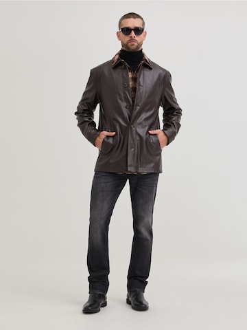 GUESS Slimfit Jeans 'Finnley' in Schwarz
