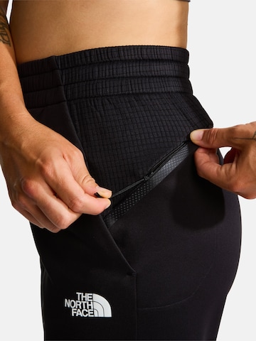 THE NORTH FACE - Tapered Pantalón de montaña 'MOUNTAIN ATHLETICS' en negro