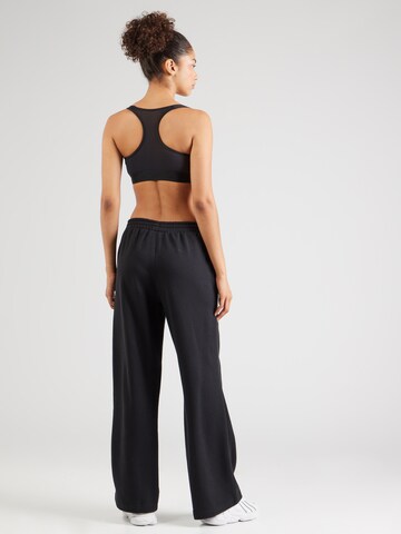 ADIDAS ORIGINALS Loose fit Pants 'Ess' in Black