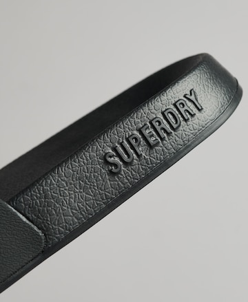 Claquettes / Tongs Superdry en noir