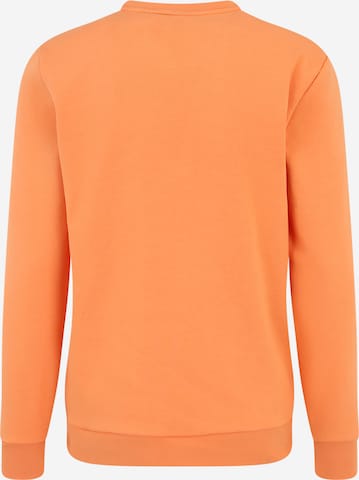 OAKLEY Bluzka sportowa w kolorze pomarańczowy