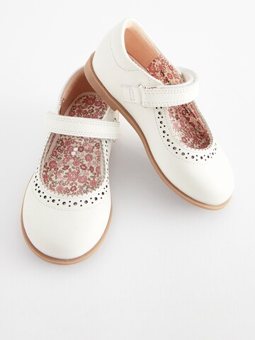 Next - Bailarina en blanco