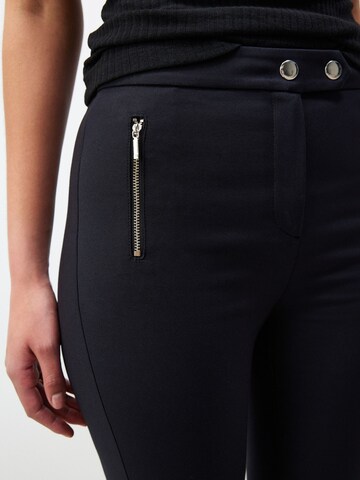 Skinny Pantalon Next en noir