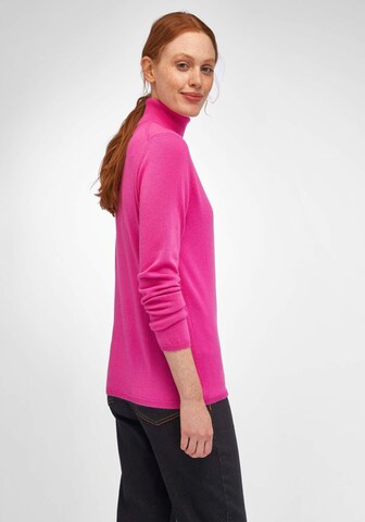 Pull-over include en rose