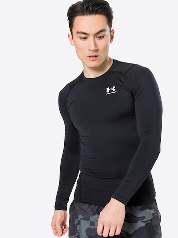 UNDER ARMOUR Λειτουργικό μπλουζάκι σε μαύρο: μπροστά