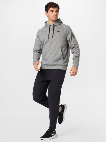 NIKE Tapered Sportsbukser i sort