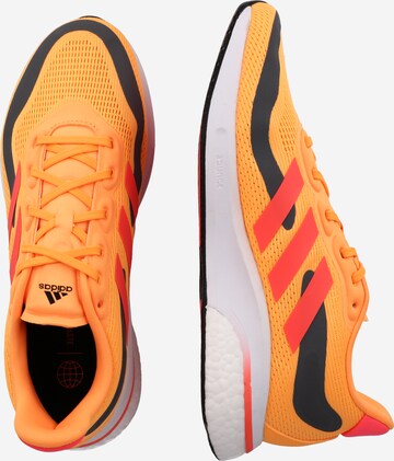 ADIDAS SPORTSWEAR - Sapatilhas baixas 'Supernova' em laranja