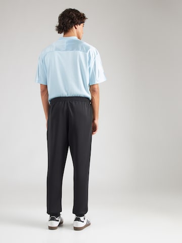 ADIDAS ORIGINALS Tapered Παντελόνι 'ESS' σε μαύρο