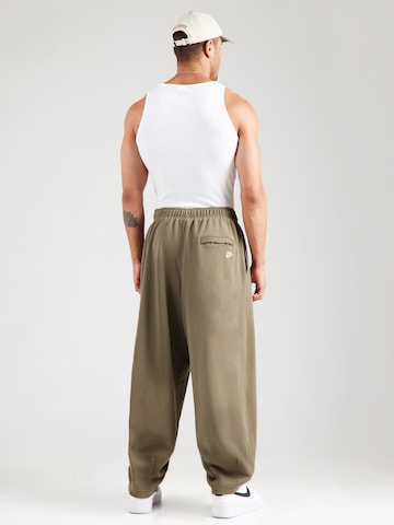Nike Sportswear Tapered Housut 'CLUB' värissä vihreä