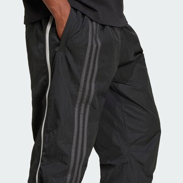 ADIDAS ORIGINALS Loose fit Trousers in Black