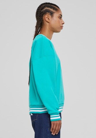 Sweat-shirt 'Retro College' Karl Kani en bleu
