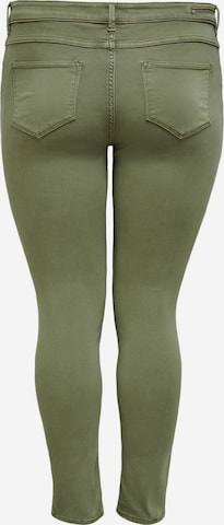 Skinny Jeans di ONLY Carmakoma in verde