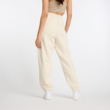 Baggy Pantalon new balance en beige