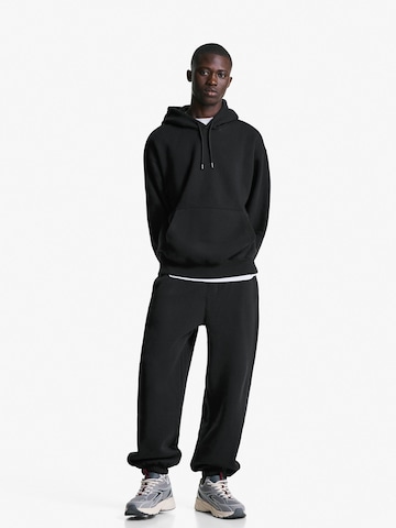Sweat-shirt Bershka en noir