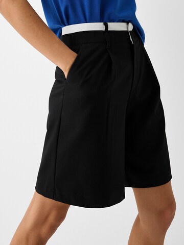 Bershka Loose fit Pleat-front trousers in Black