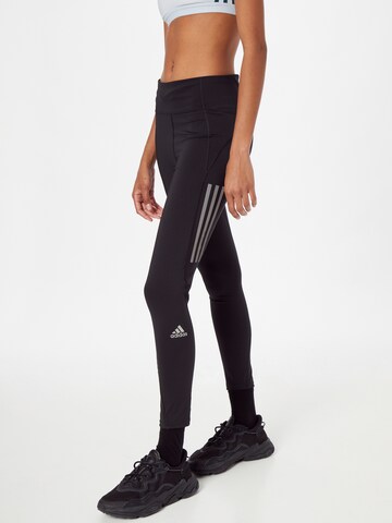 Skinny Pantaloni sport 'Own The Run' de la ADIDAS SPORTSWEAR pe negru: față