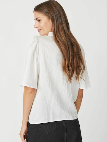 Chemisier 'Molly' co'couture en blanc