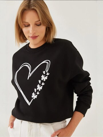 Sweat-shirt Bianco Lucci en noir : devant