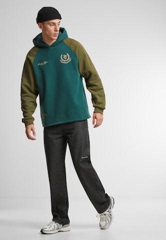 Another Cotton Lab - Sudadera 'Sunday Running' en verde