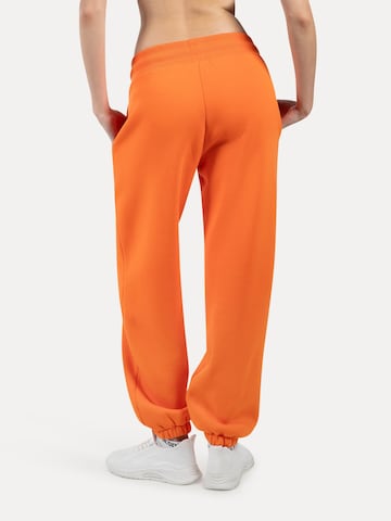 Effilé Pantalon Smilodox en orange